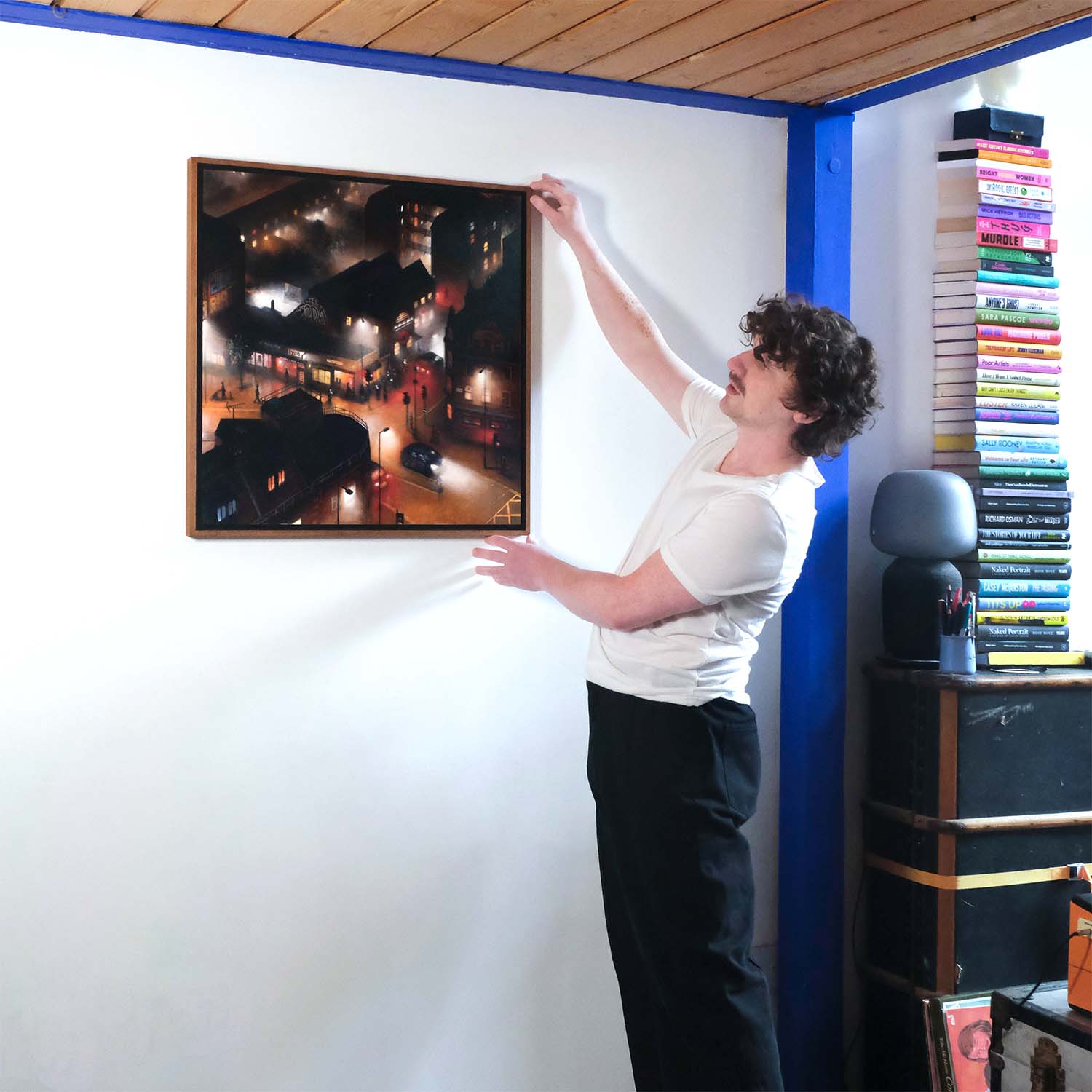 'If you make noise outside, Moth Club won't be able to make noise inside' - 2026 - Lawrence Brand the artist standing next to the painting
